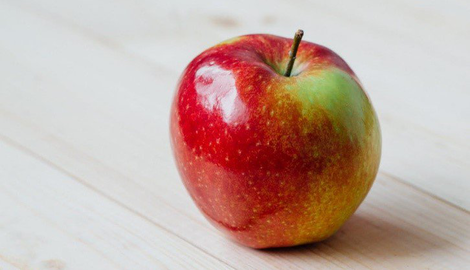 Waarom is de schil van een appel soms vettig?